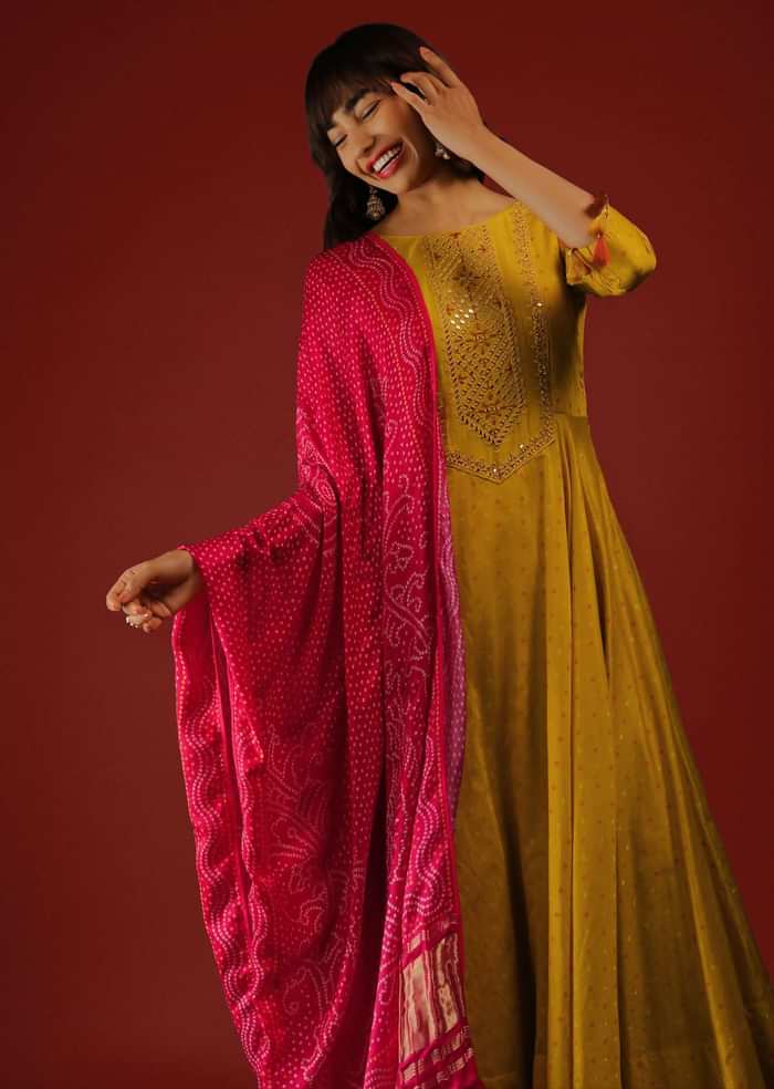 Mustard Anarkali Suit In Brocade Silk With Mirror Embroidery And Red Bandhani Dupatta