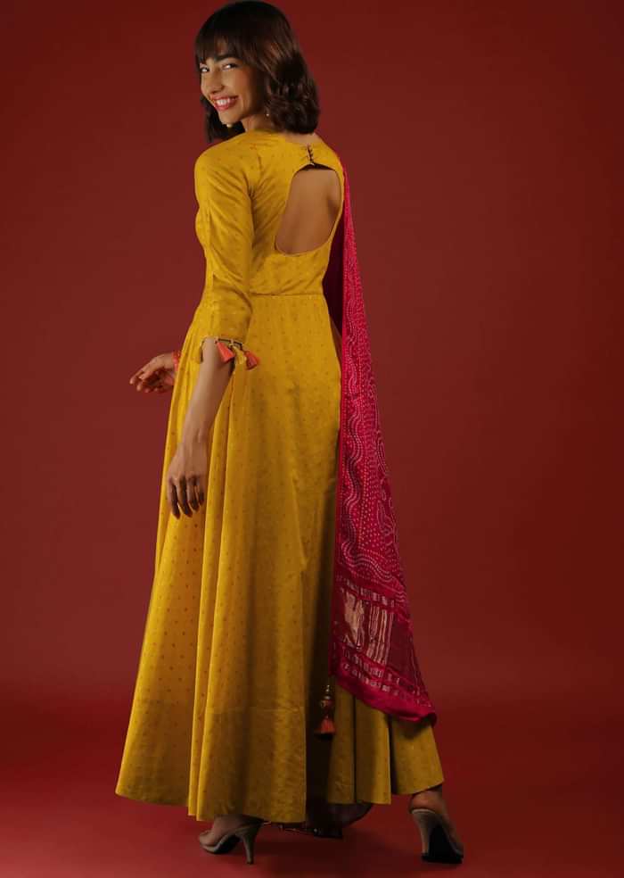 Mustard Anarkali Suit In Brocade Silk With Mirror Embroidery And Red Bandhani Dupatta