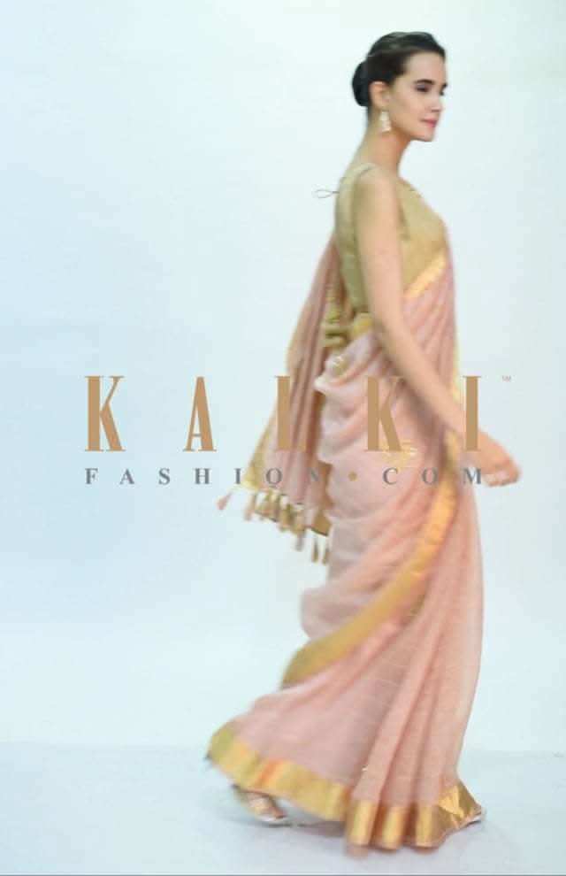 Pale peach linen saree with cut dana and zari butti only on Kalki