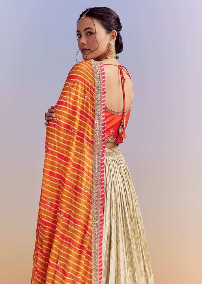 Orange Brocade Silk Bridesmaid Lehenga With Leheriya Dupatta