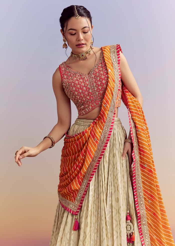 Orange Brocade Silk Bridesmaid Lehenga With Leheriya Dupatta