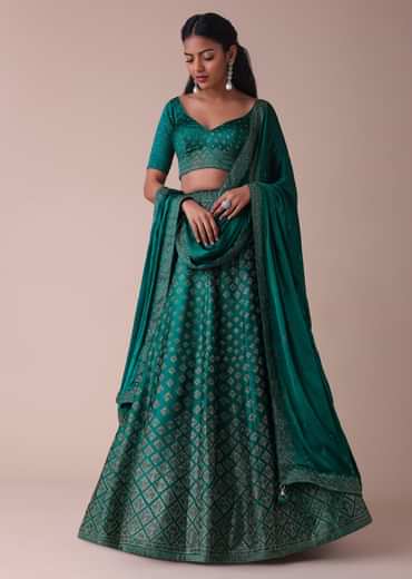 Deep Green Swarovski Embellished Lehenga In Wrinkle Satin