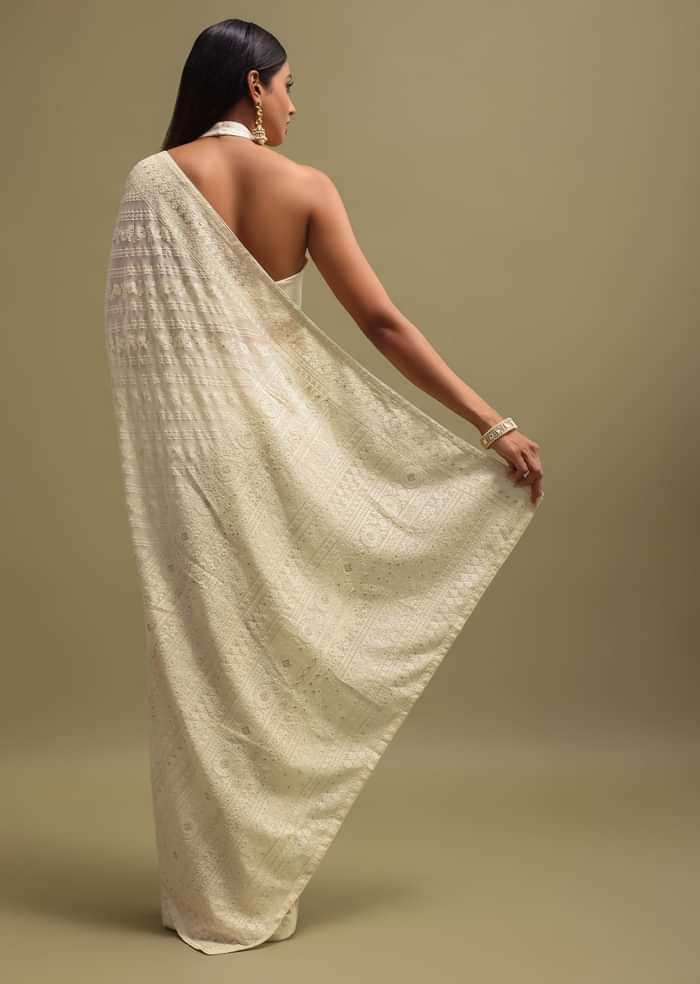 Off White Georgette Saree In Chikankari Work With Unstitched Blouse