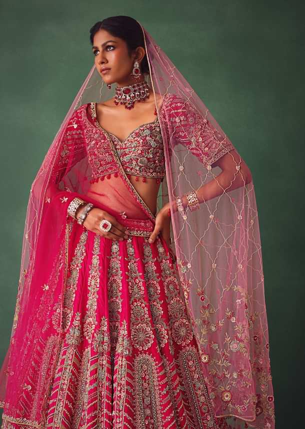 Raw Silk Red Bridal Lehenga With Embroidered Blouse And Scallop Dupatta