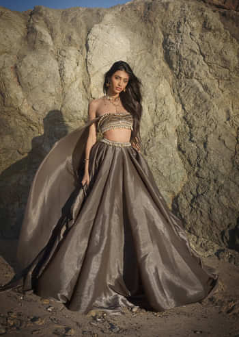 <p>Dusty Brown Cowl Lehenga</p> <p>Dusty Brown Cowl Lehenga</p>