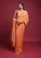 Amber Orange Saree In Georgette With Weaved Buttis And Floral Pattern On The Border
