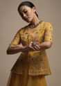 Dark Amber Yellow Palazzo Suit In Organza With Matching Peplum Top Adorned In Zari And Thread Work