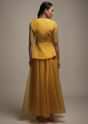 Dark Amber Yellow Palazzo Suit In Organza With Matching Peplum Top Adorned In Zari And Thread Work