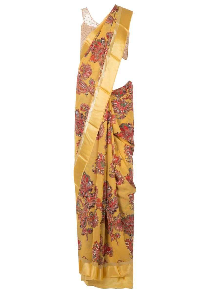 Amber yellow saree in satin with big floral print only on Kalki - KALKI Fashion India