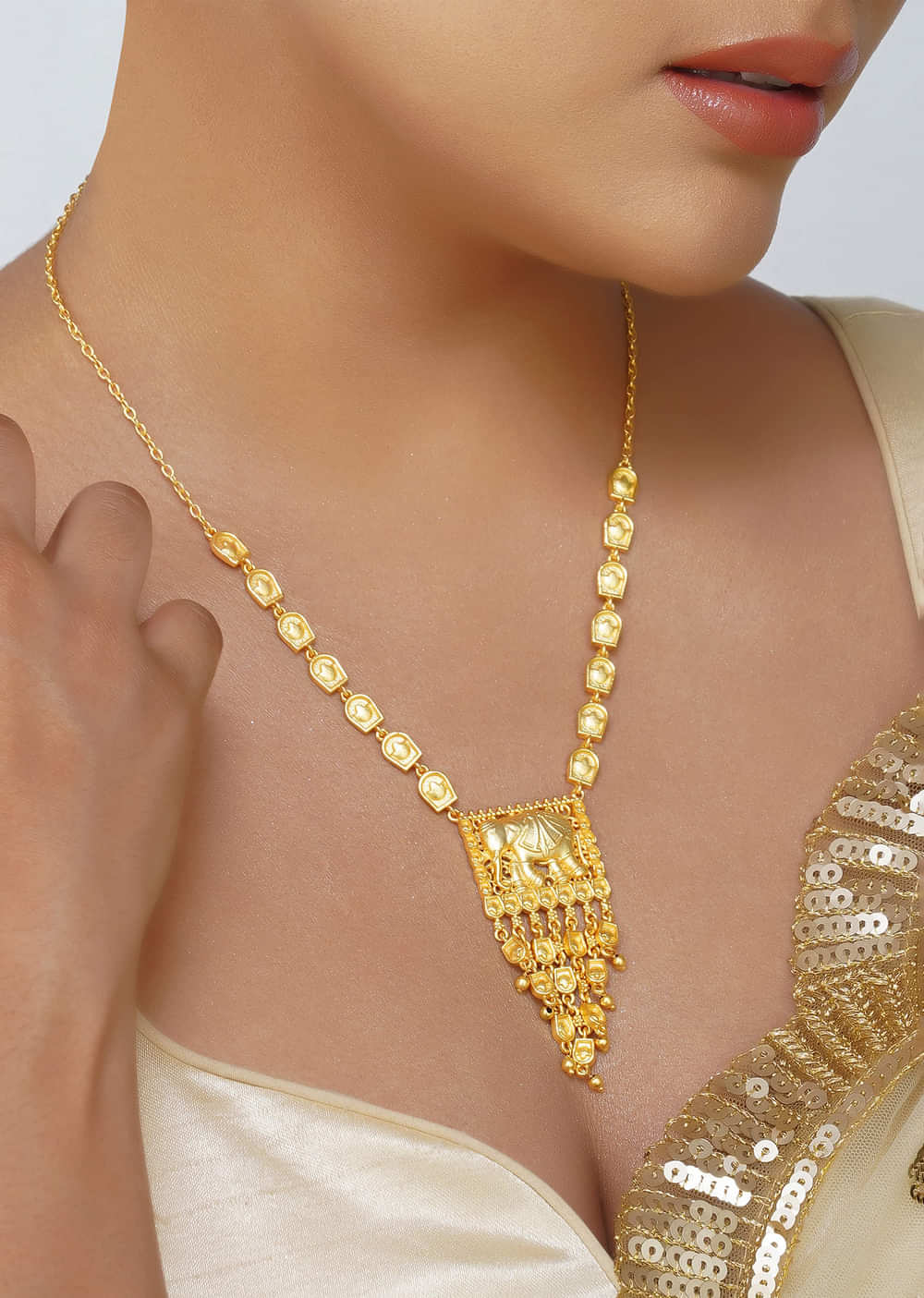 Antique Gold Pendant Necklace With Tusk Motif