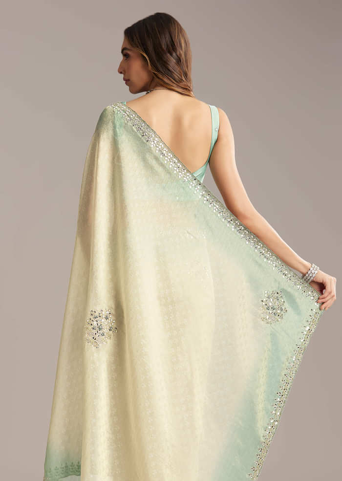 Aqua Blue Jacquard Saree With Mirror And Bead Embroidery