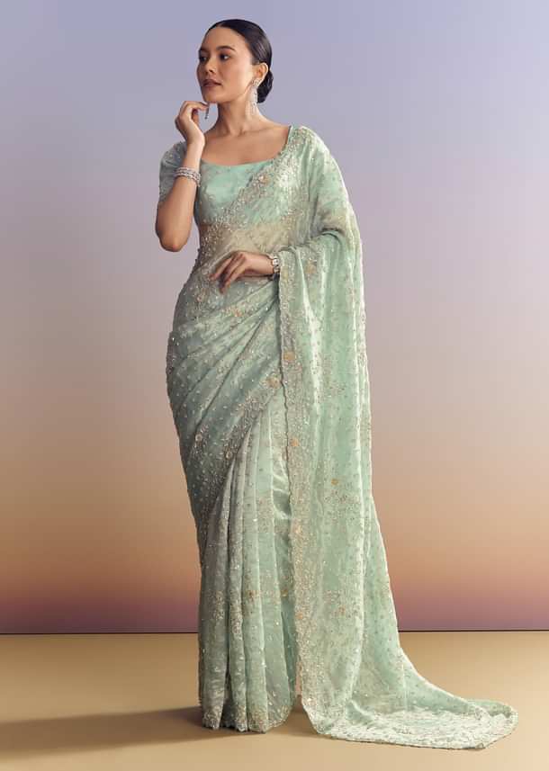 Aqua Blue Tissue Saree With Cutwork And Unstitched Embellished Blouse