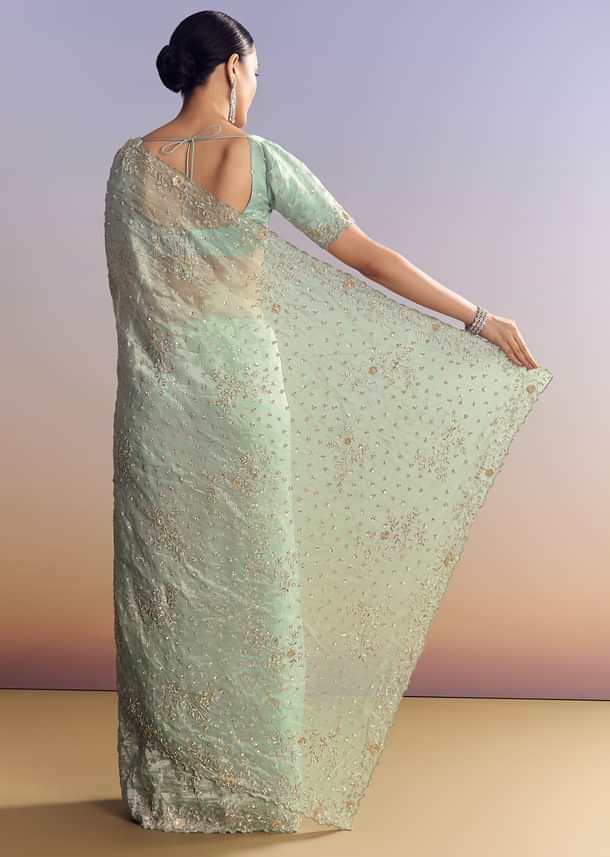 Aqua Blue Tissue Saree With Cutwork And Unstitched Embellished Blouse
