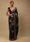 Ash Black Saree In Satin Crepe With Rose Print And Kundan Detailed Border Along With Unstitched Blouse