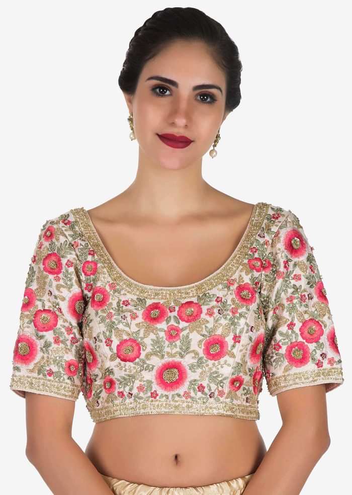 Baby pink saree in net with a ready raw silk blouse beautified in resham work only on Kalki