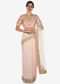 Baby pink saree in net with a ready raw silk blouse beautified in resham work only on Kalki