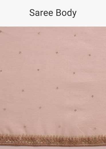 Beige Crushed Tissue Saree With Stone Embellishment And Glossy Finish