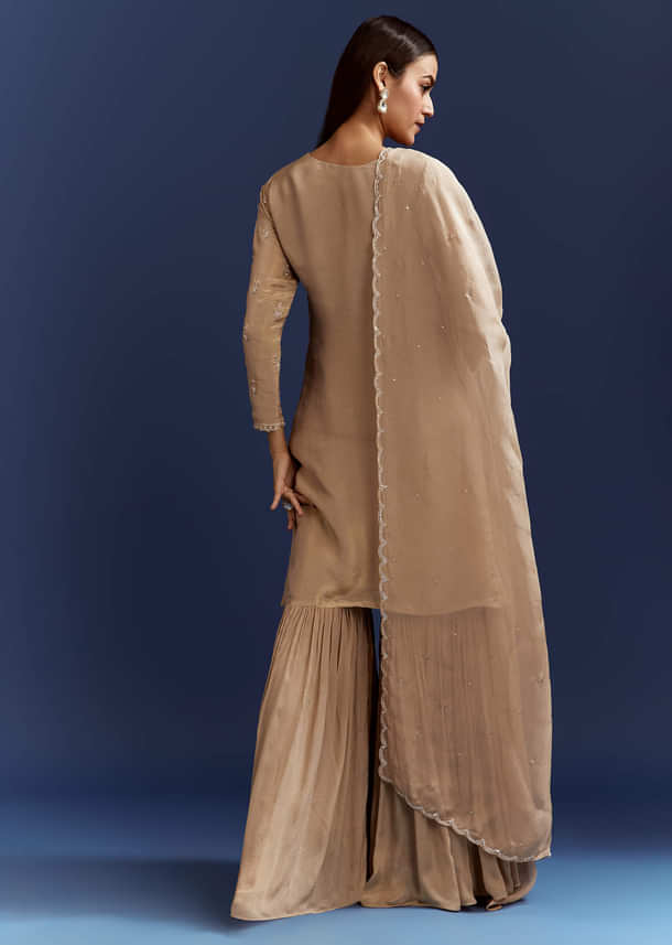 Beige Sequins And Cutdana Kurta With Sharara And Organza Dupatta Beige Sequins And Cutdana Kurta With Sharara And Organza Dupatta