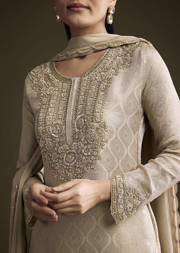 Beige Tissue Palazzo Suit With Banarasi Weave And Sequins Embroidery Beige Tissue Palazzo Suit With Banarasi Weave And Sequins Embroidery