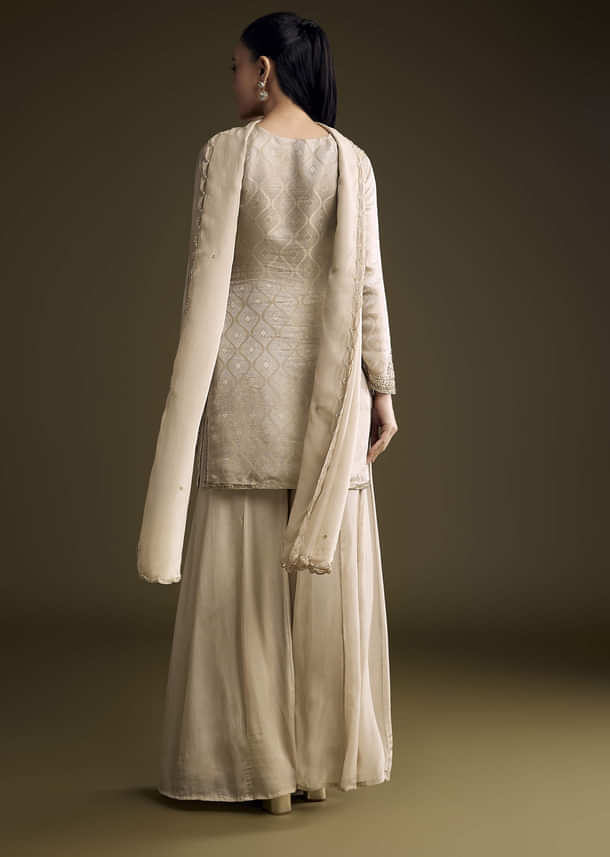Beige Tissue Palazzo Suit With Banarasi Weave And Sequins Embroidery Beige Tissue Palazzo Suit With Banarasi Weave And Sequins Embroidery