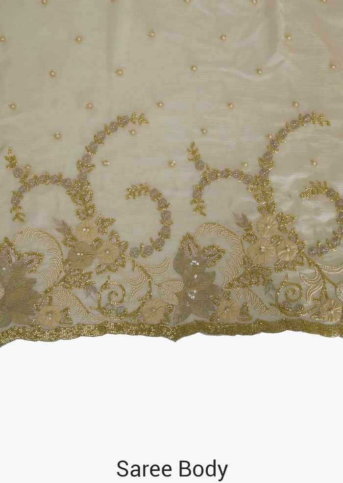 Beige Chiffon Saree and Blouse Crafted with Zari, Cut Dana and Moti only on Kalki