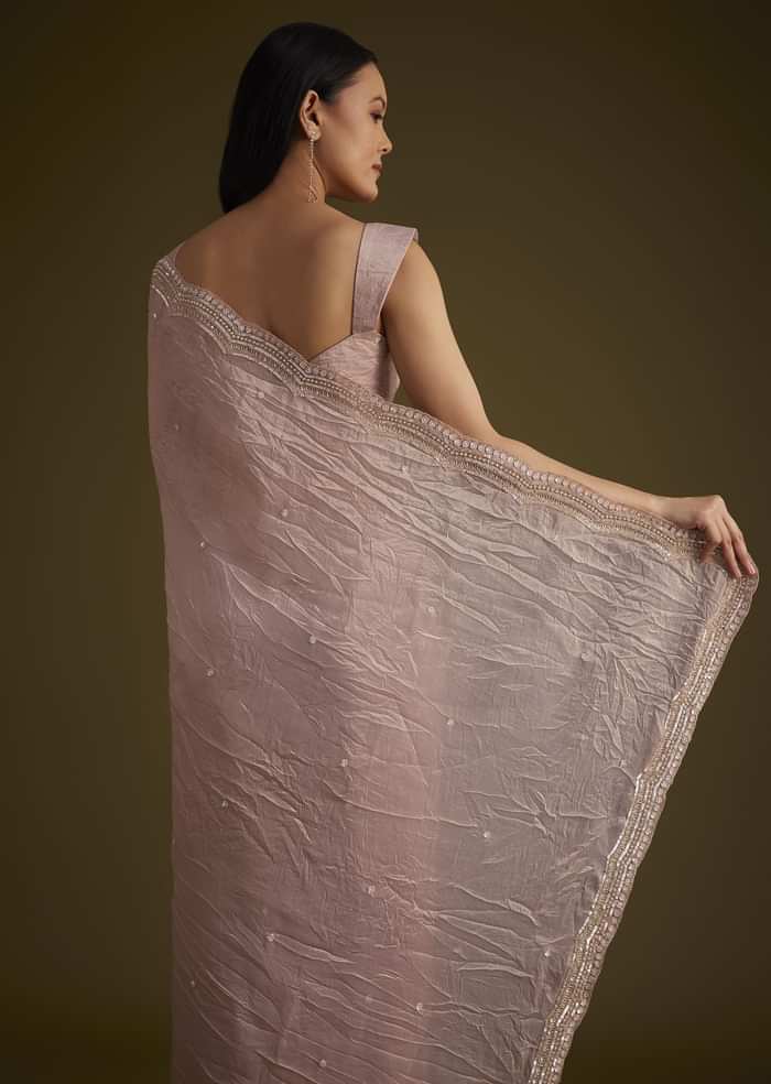 Beige Crushed Tissue Saree With Embroidered Border