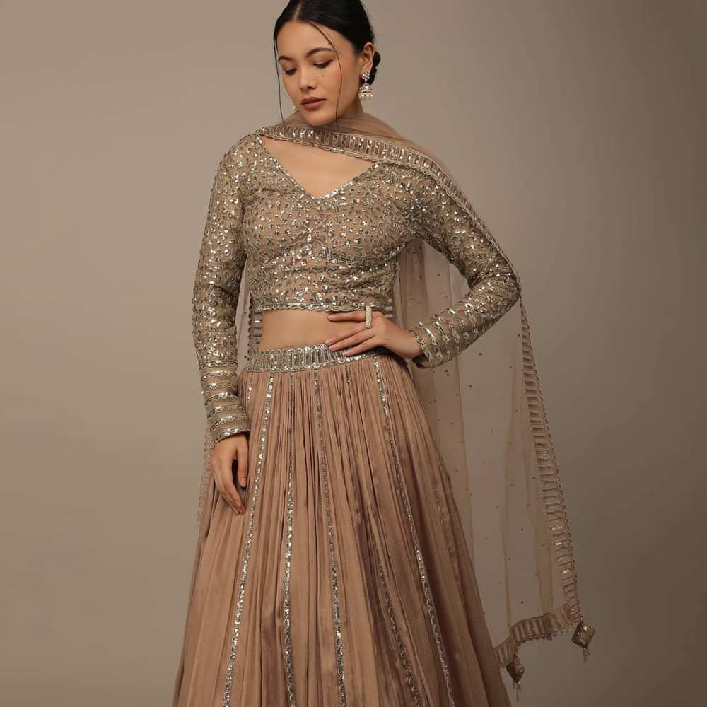 Beige Festive Sequins And Zari Embroidered Lehenga Set In Chinon