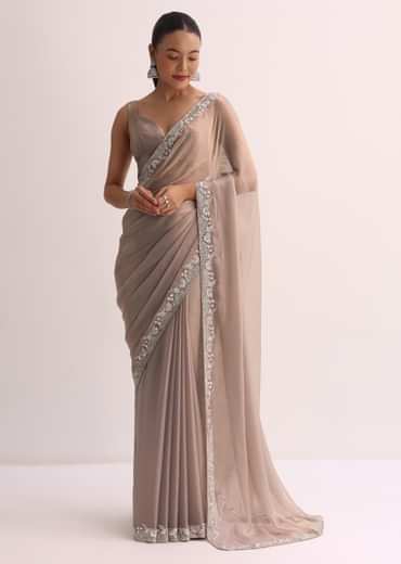 Beige Saree With Embroidered Border And Unstitched Blouse