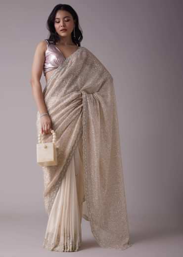 Salmon Pink Sequins Saree With An Embellished Border