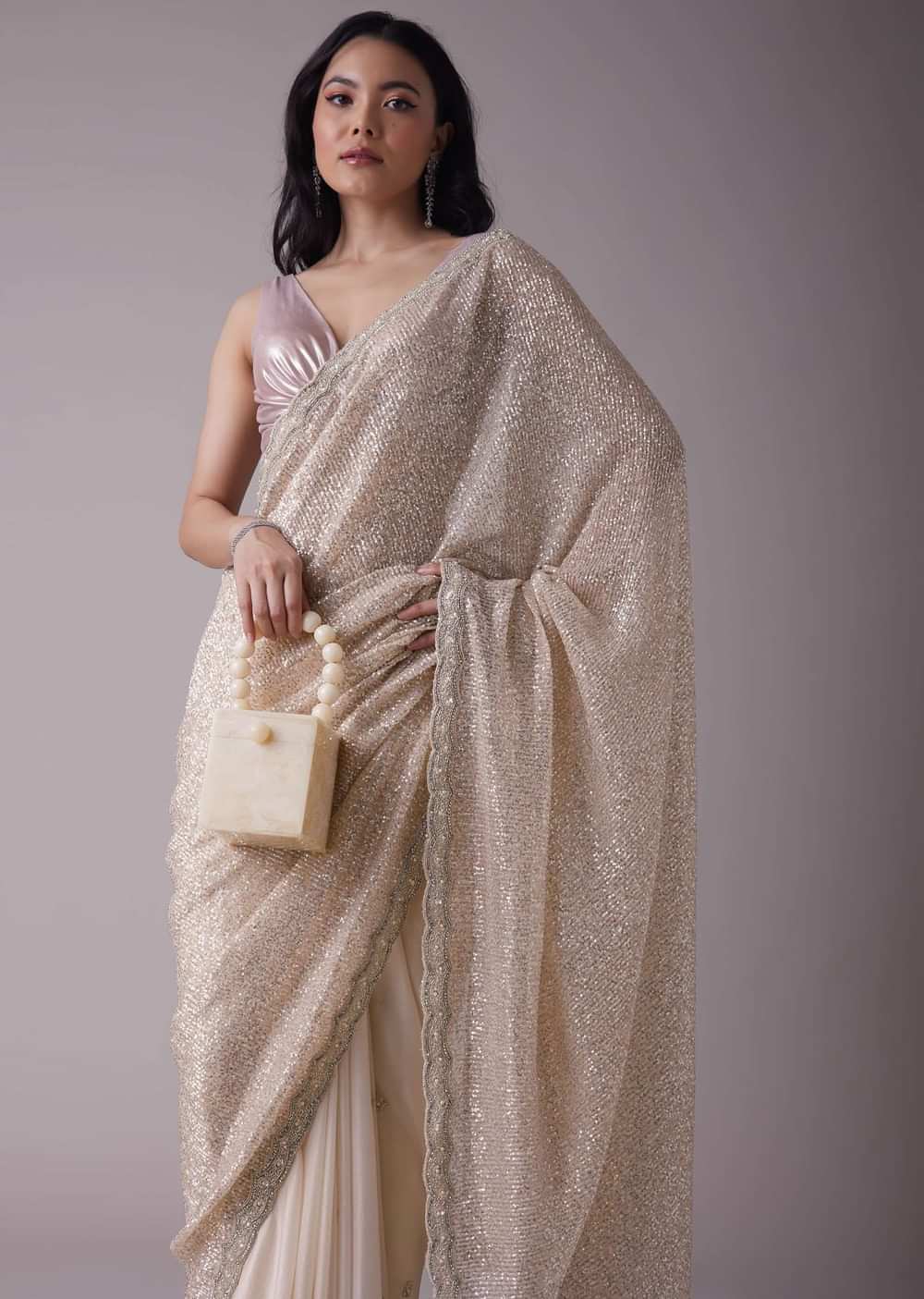 Salmon Pink Sequins Saree With An Embellished Border