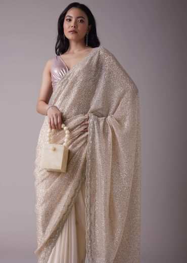 Salmon Pink Sequins Saree With An Embellished Border