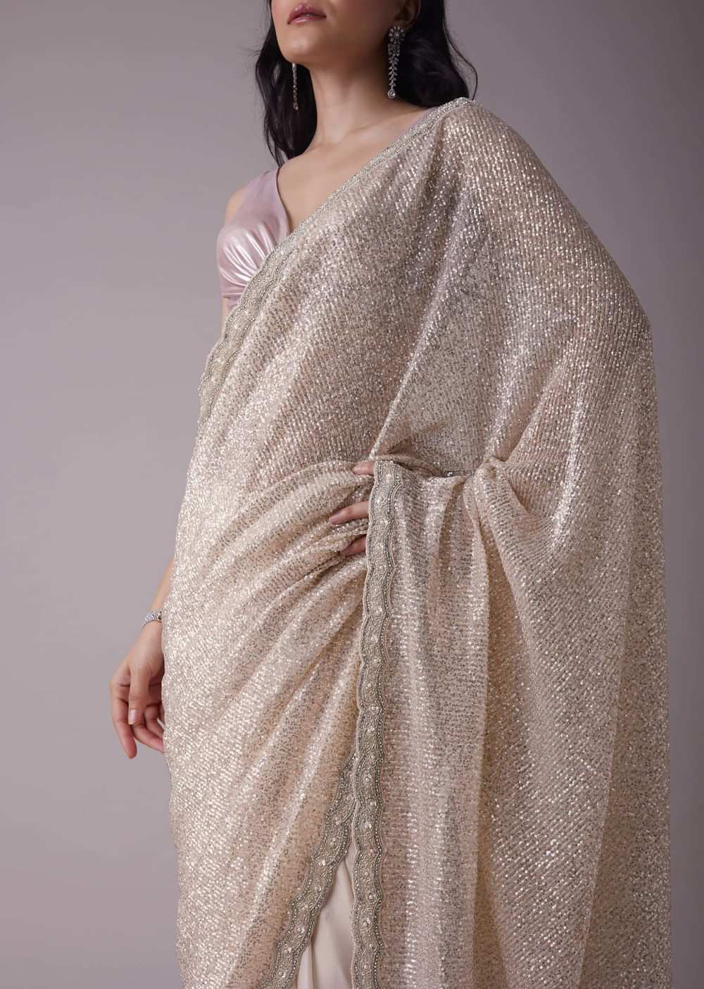 Salmon Pink Sequins Saree With An Embellished Border