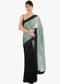 Black and green half and half saree in net and chiffon satin only on Kalki