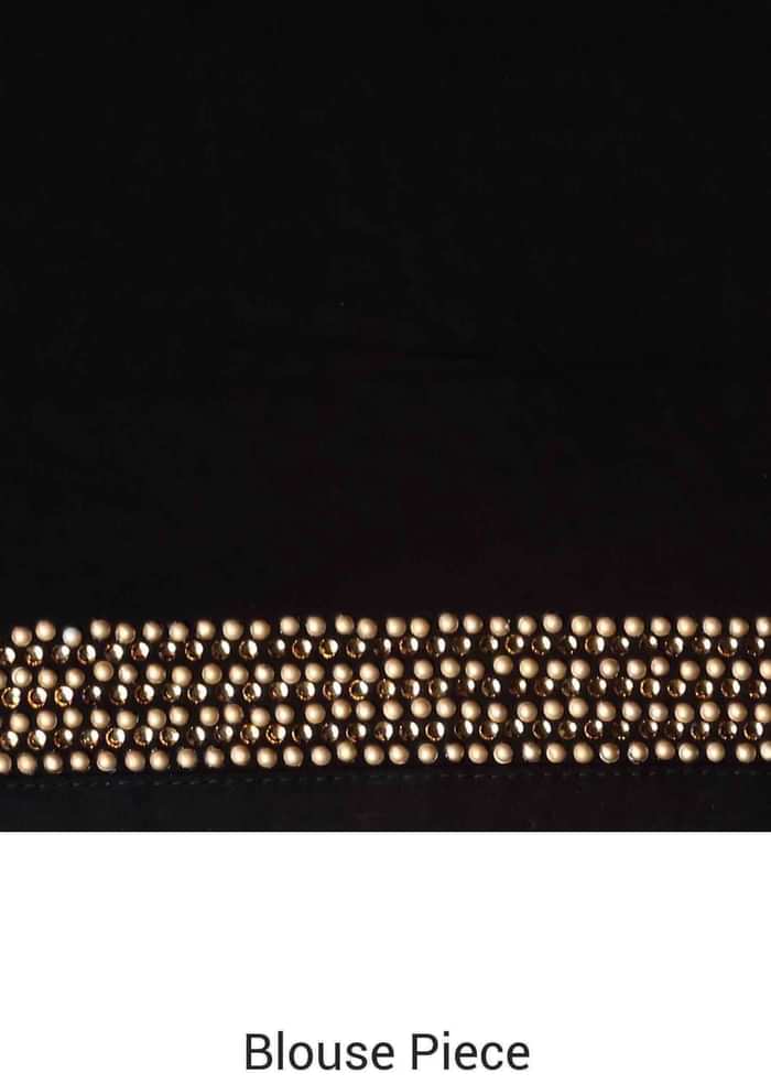 Black saree adorn in gold and silver kundan embroidery only on Kalki