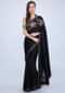 Black satin saree with multi color floral kundan work only on Kalki