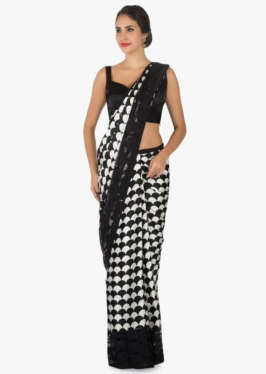 Black and white satin silk saree with unstitched blouse