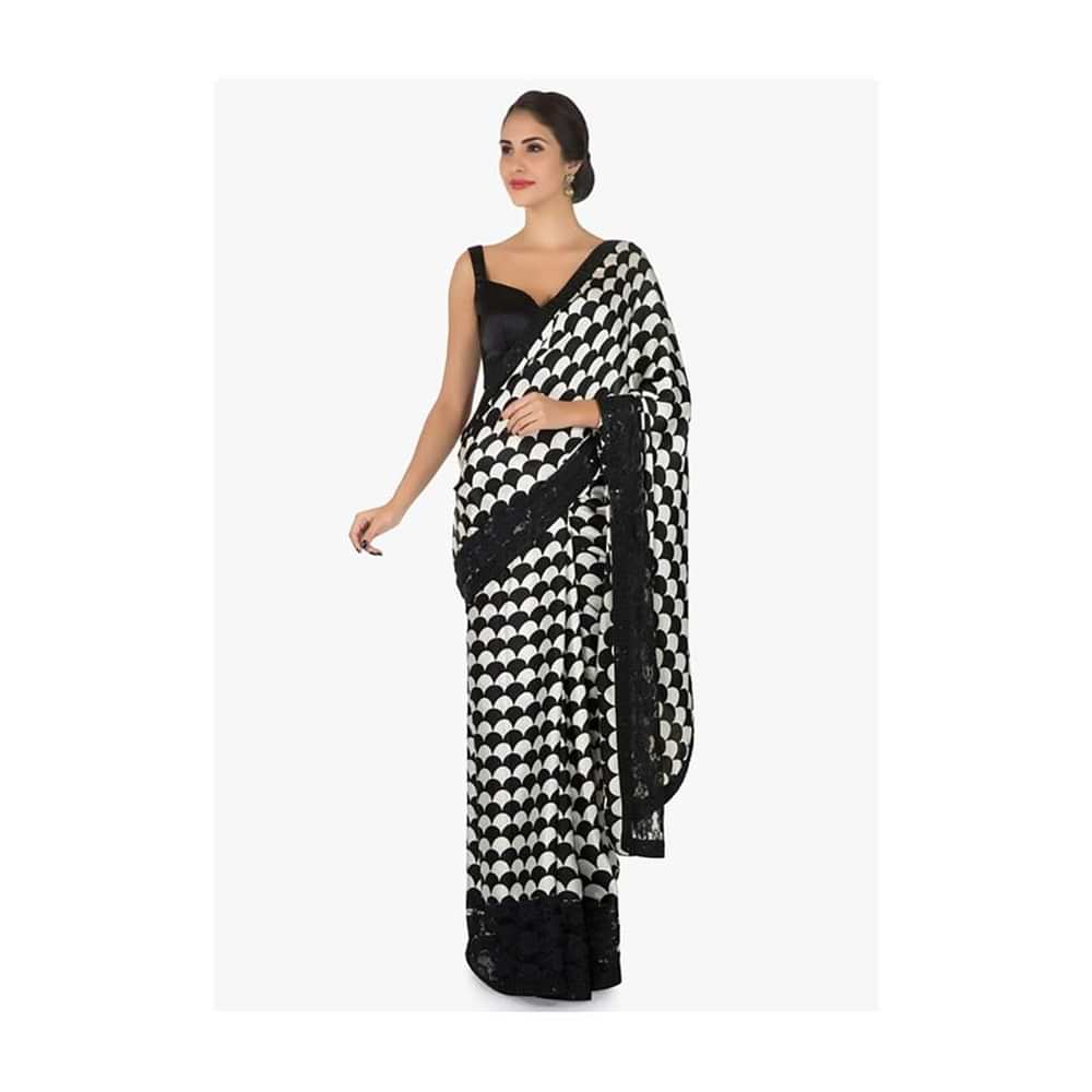 Black and white satin silk saree with unstitched blouse only on Kalki