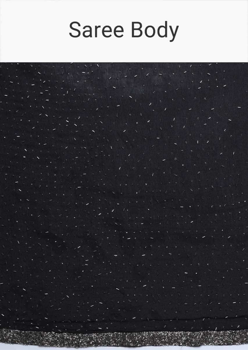 Black chiffon saree with heavy cut dana and pot embroidered border only on Kalki