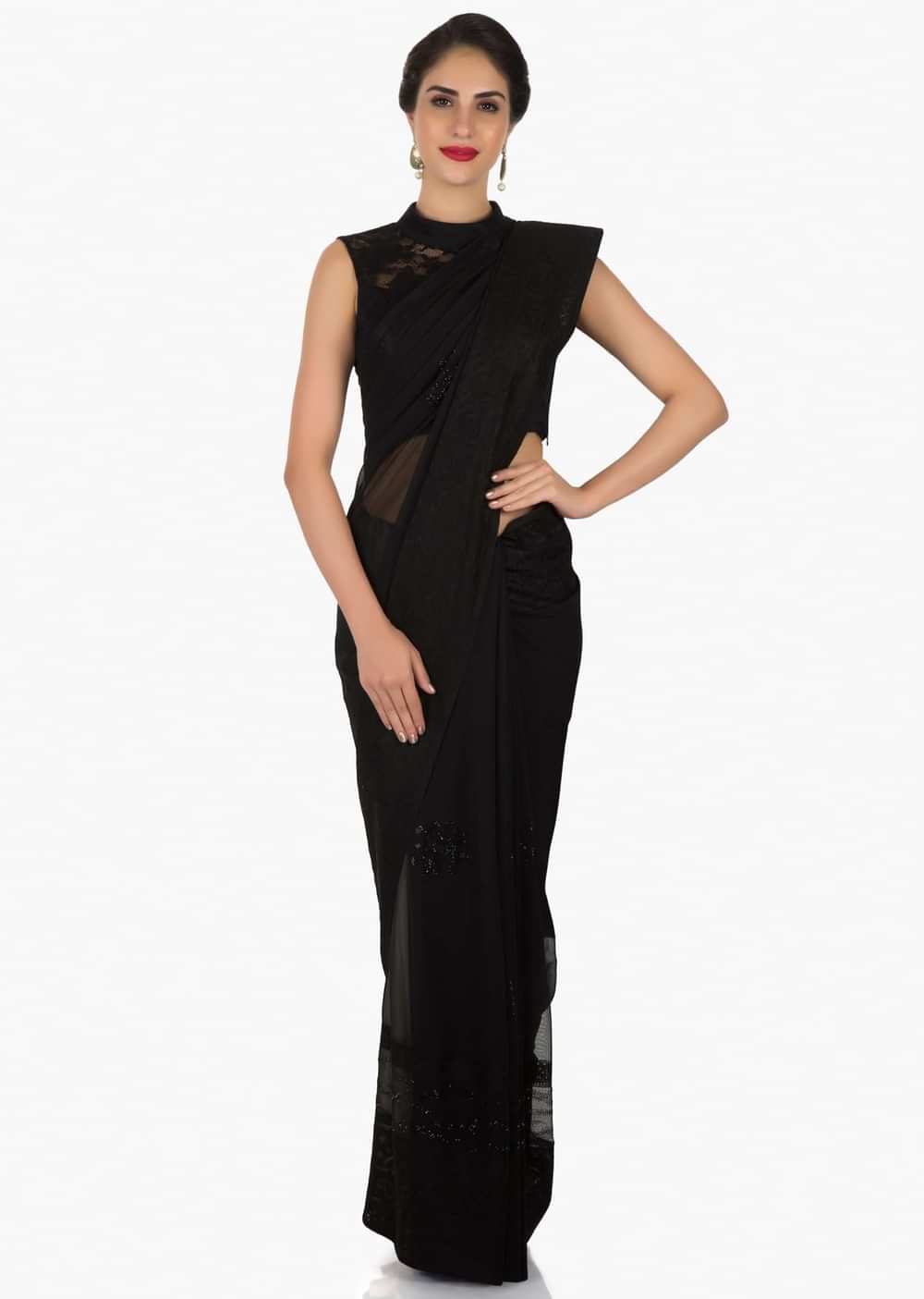 Black georgette saree adorn in thread and kundan work only on Kalki