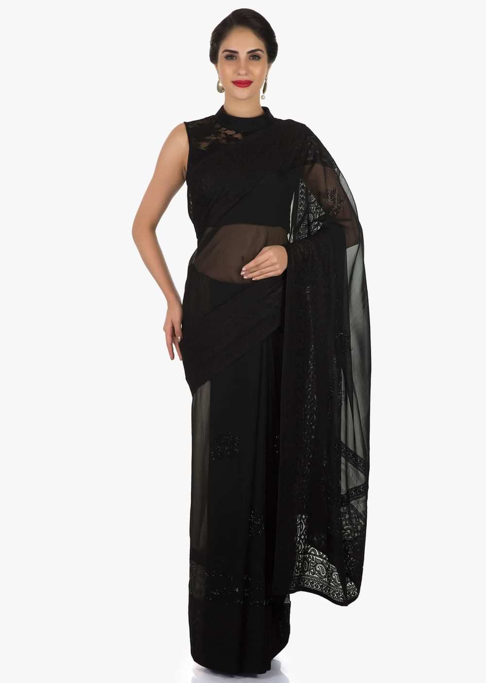 Black georgette saree adorn in thread and kundan work only on Kalki