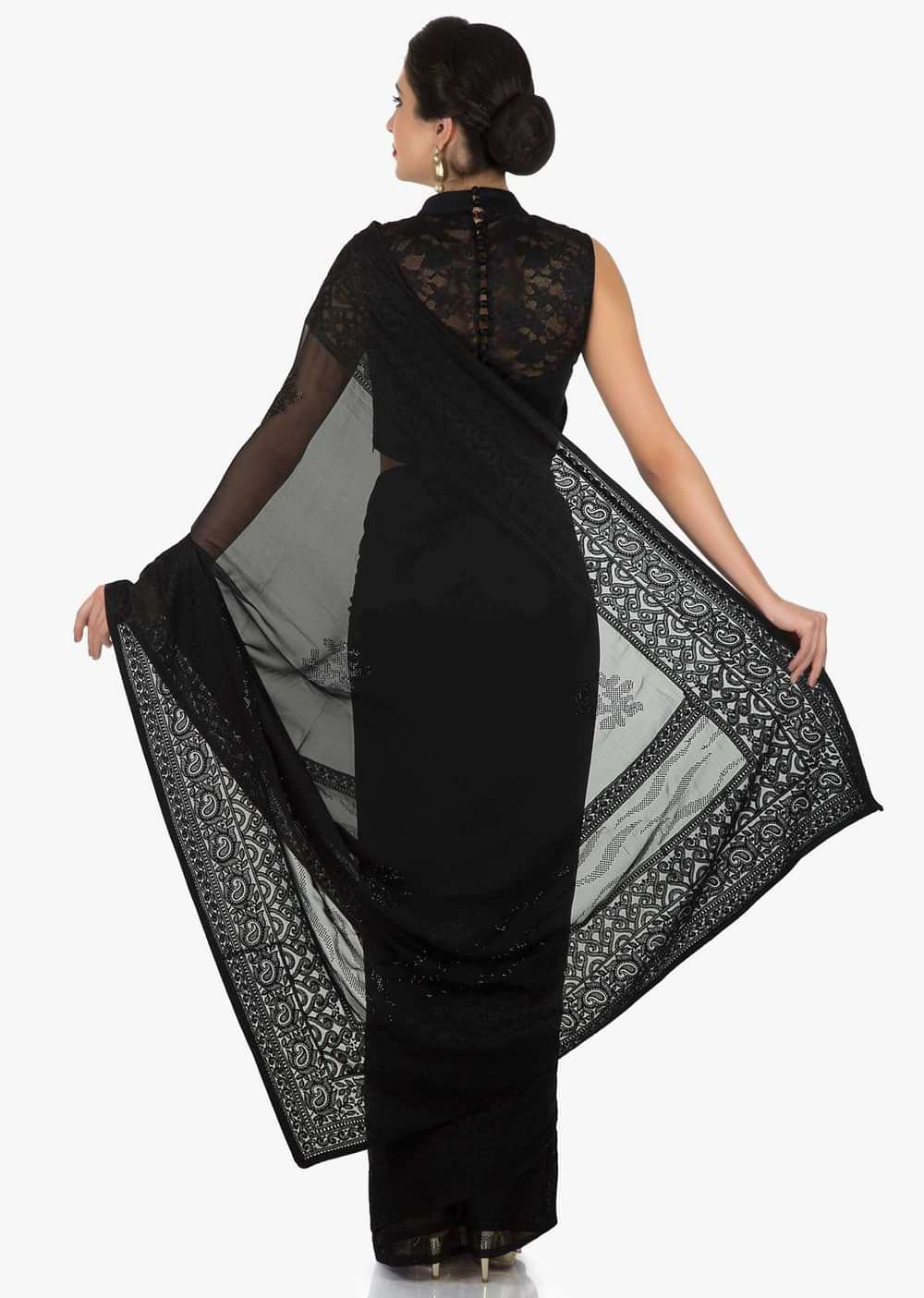 Black georgette saree adorn in thread and kundan work only on Kalki