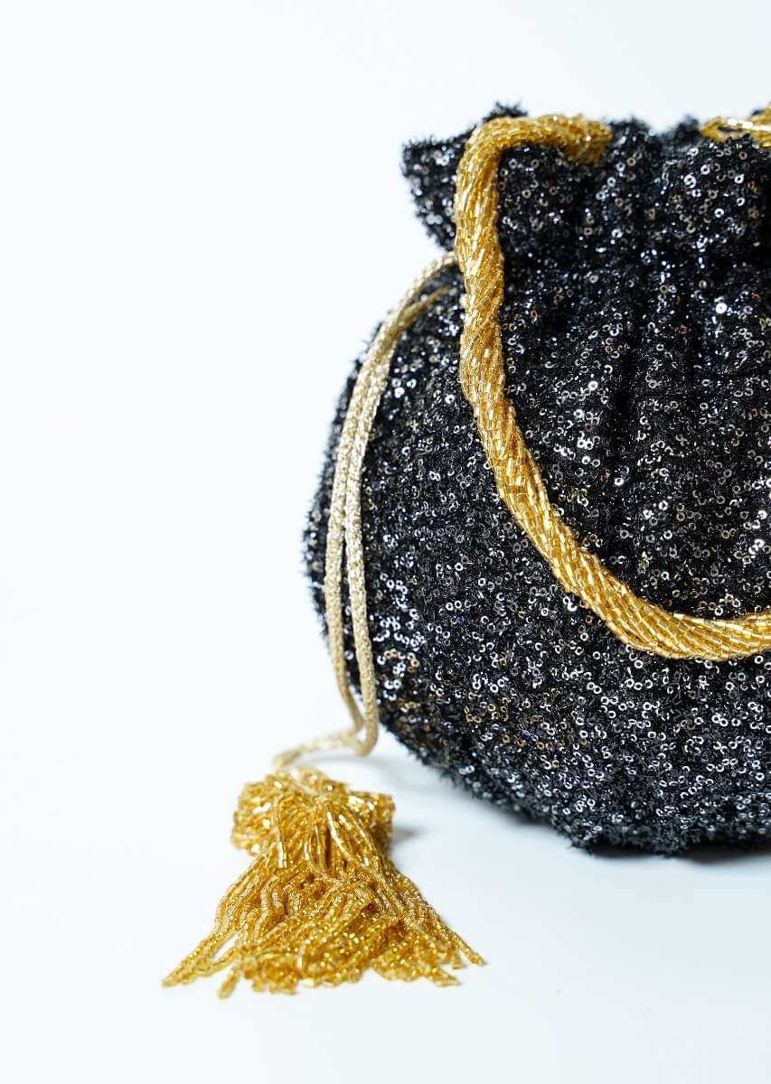 Black Potli Bag In Sequins Fabric With Cut Dana Tassels And Handle By Solasta