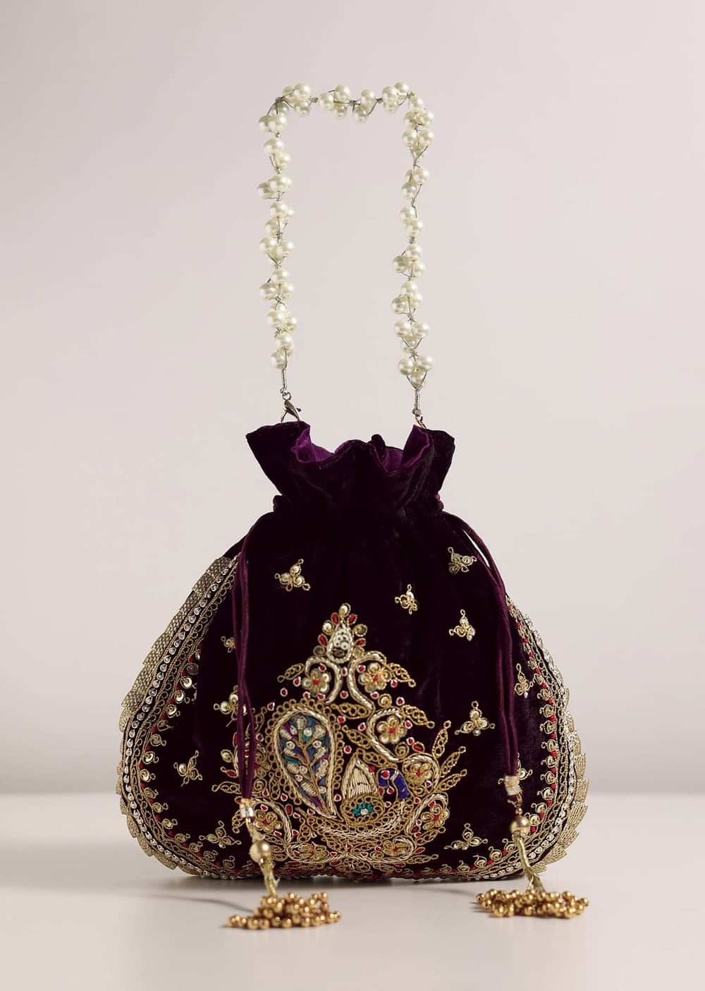 Black Raw Silk Festive Potli Bag With Heavy Motif Detailing