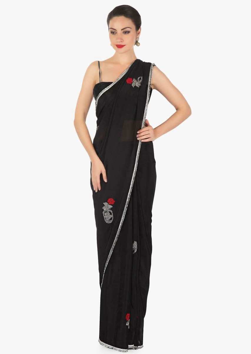 Black saree in chiffon satin with resham and cut dana embroidered butti in rose motif