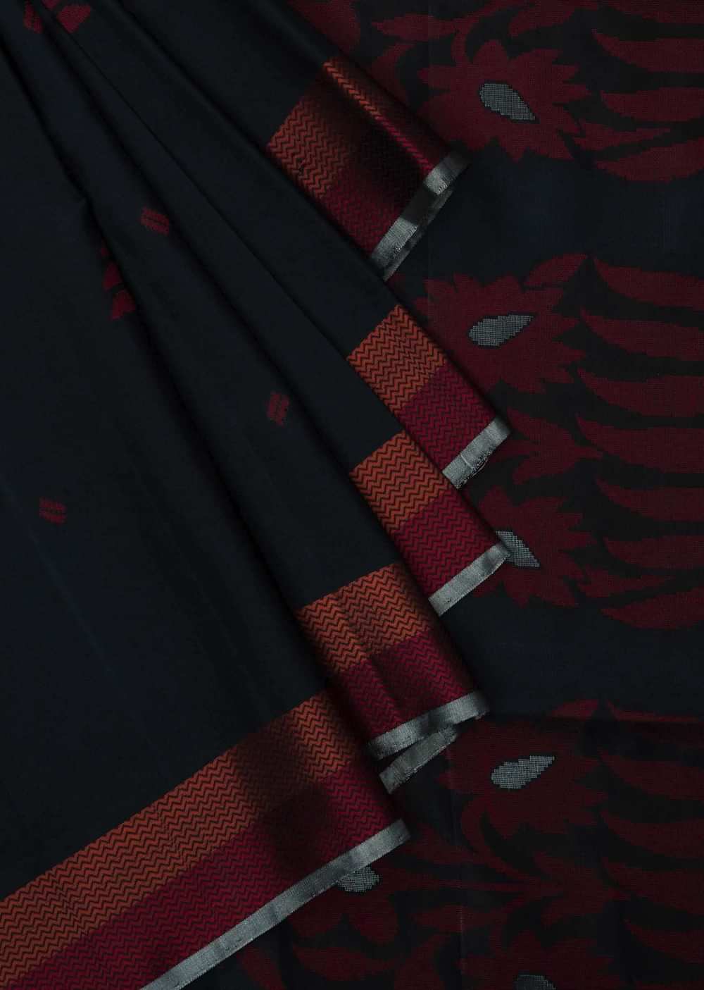 Black saree in silk beautified in weaved embroidery only on Kalki