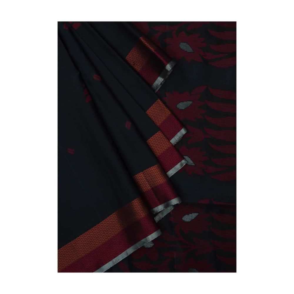 Black saree in silk beautified in weaved embroidery only on Kalki