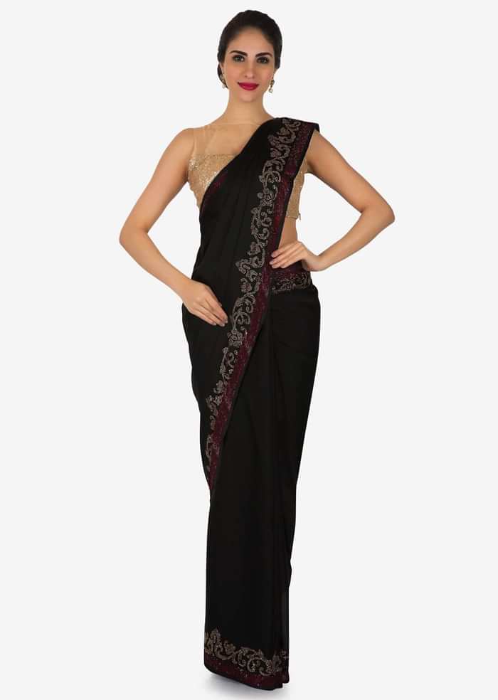 Black satin silk saree with unstitched blouse adorn in kundan embroidery work only on Kalki