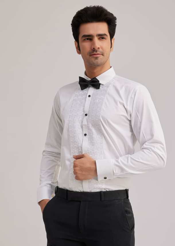 Black Suiting Tuxedo With Metallic Chain And Stone Work