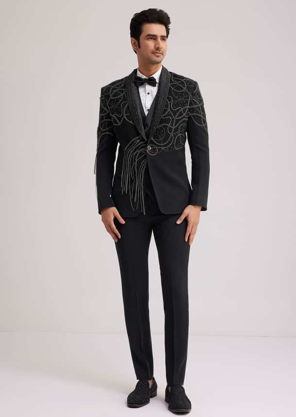 Black Suiting Tuxedo With Metallic Chain And Stone Work