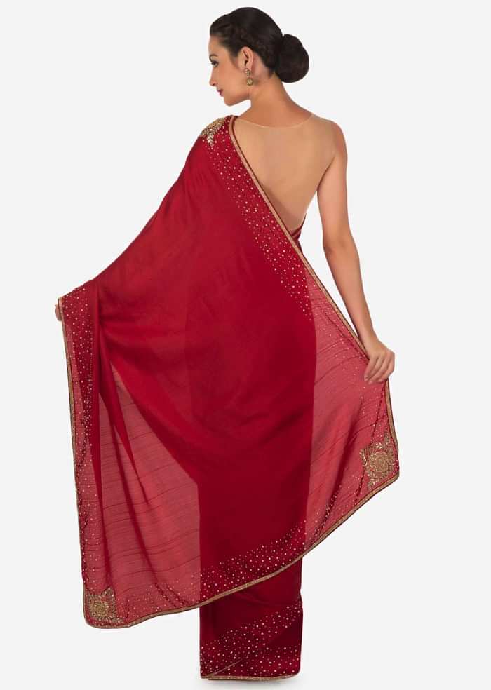 Blood red saree in satin chiffon with moti and zardosi embroidery only on Kalki